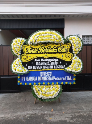 Papan Bunga Duka di Sindutan